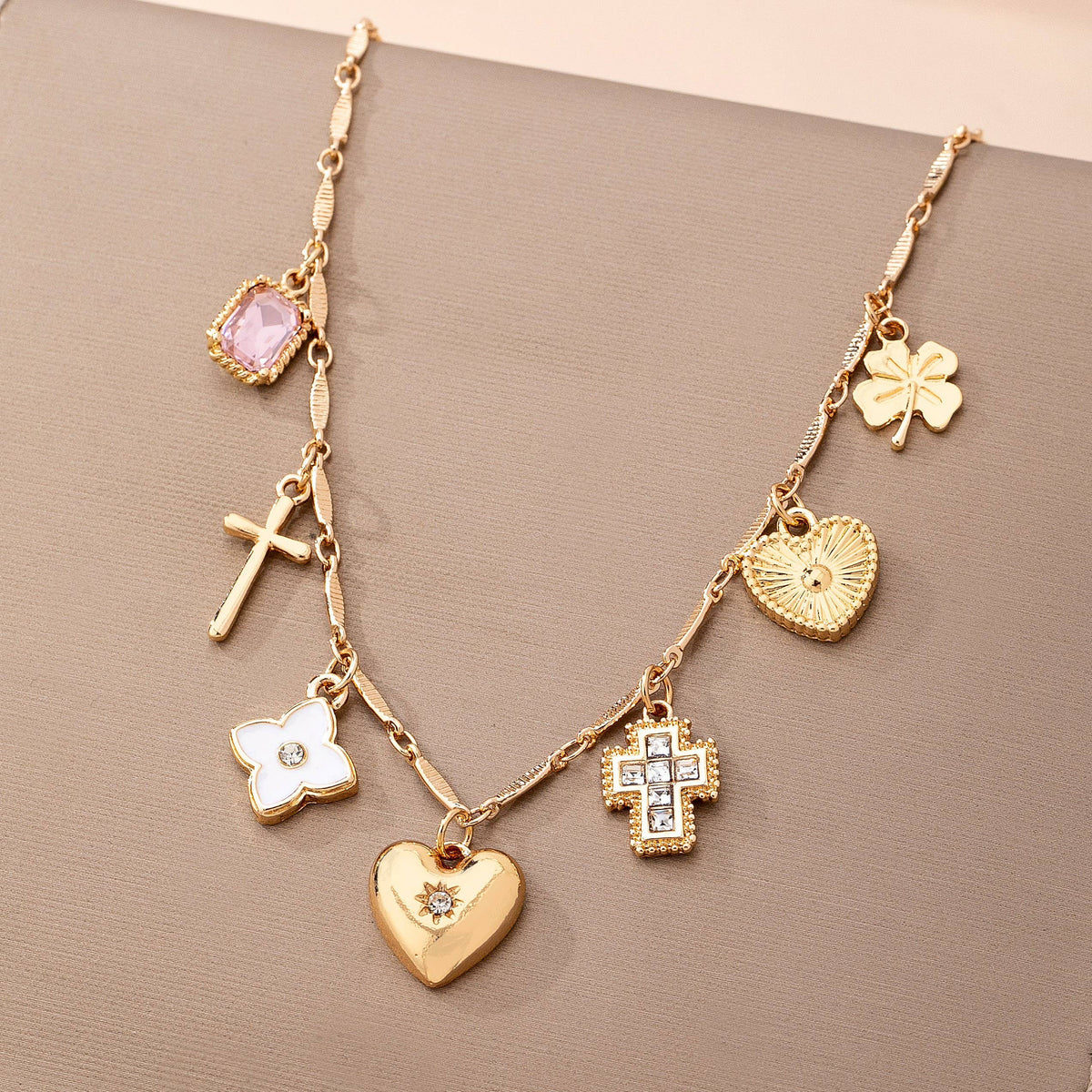 Charm Necklace with crosses, Hearts, Flowers and Clovers