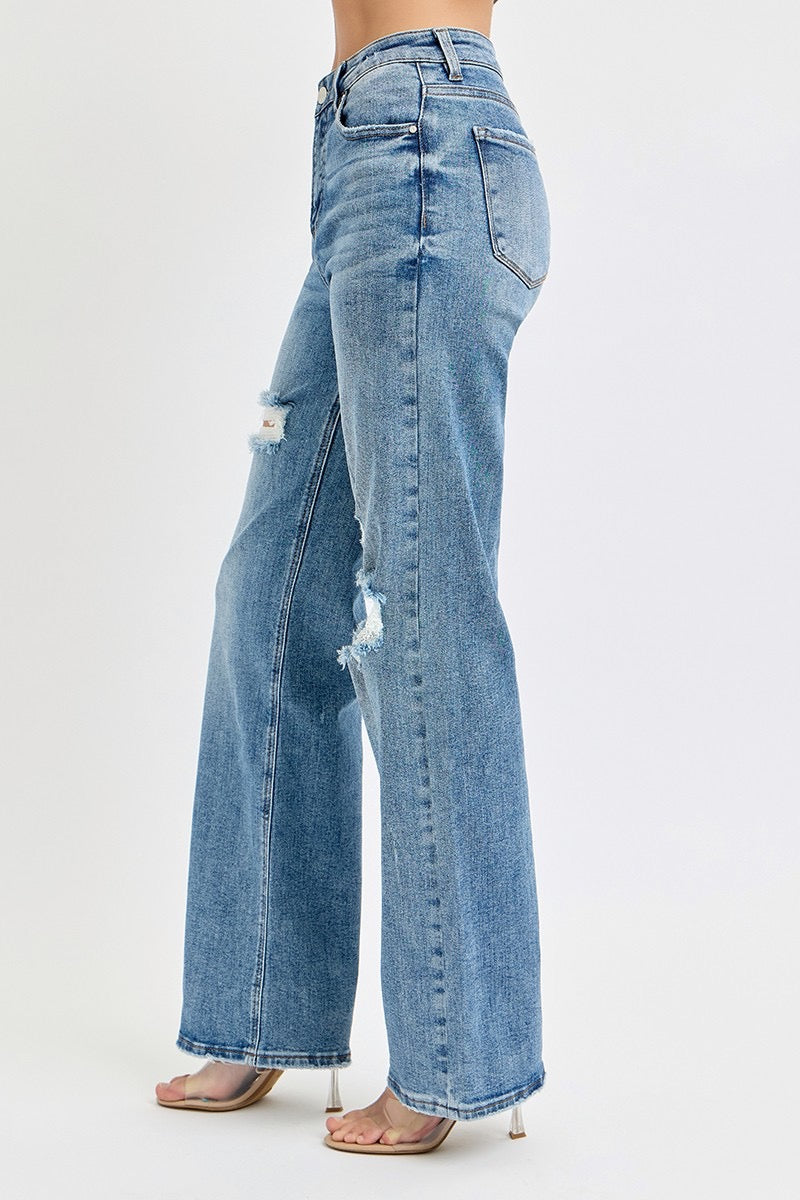 Risen High Rise Wide Leg Ripped Jeans