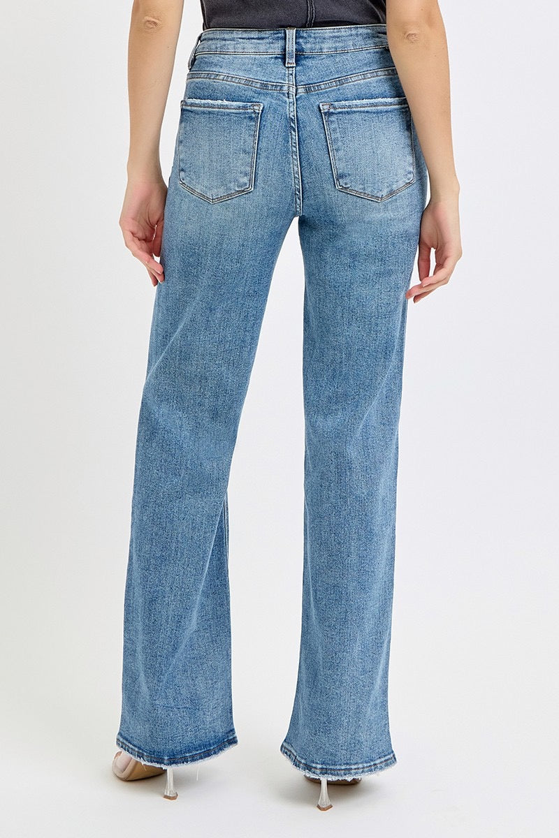 Risen High Rise Wide Leg Ripped Jeans
