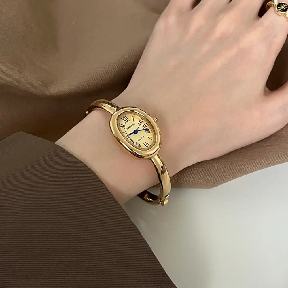 Trendy Oval Dial Gold Quartz Wrist Watch