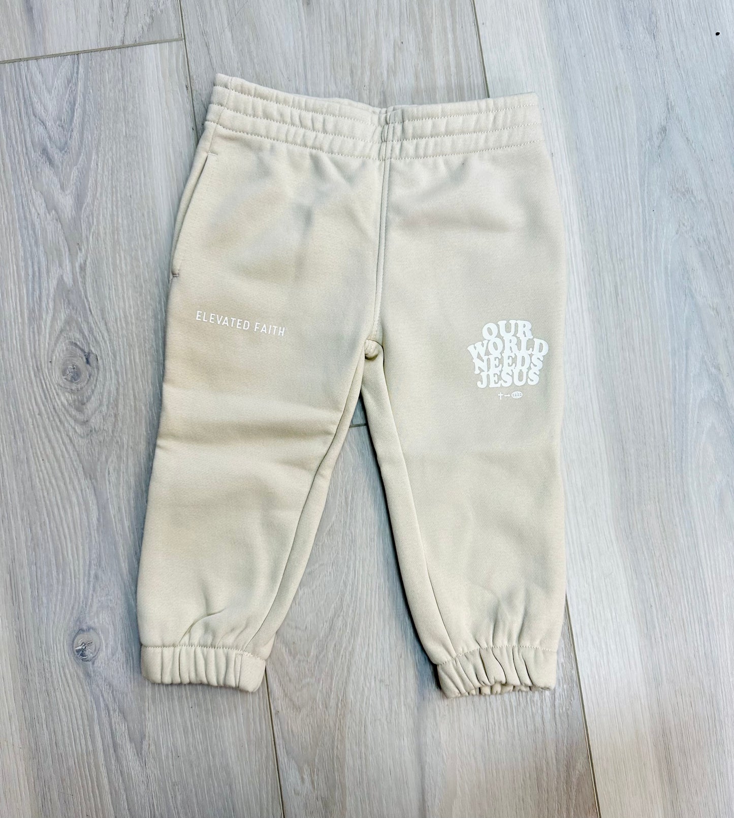 Our World Needs Jesus Kids Sweatpants