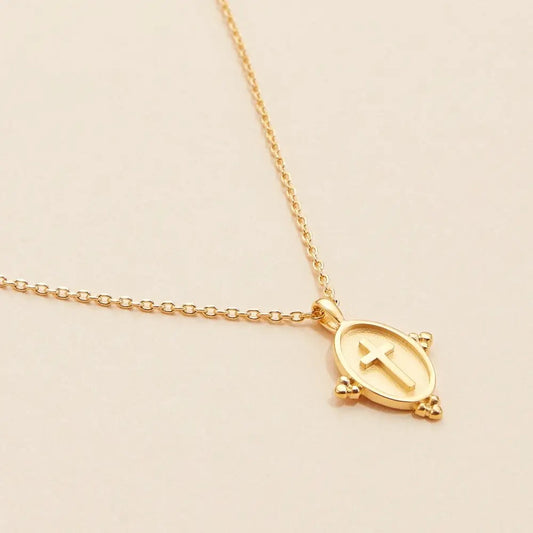 Gold Oval Coin Cross Necklace