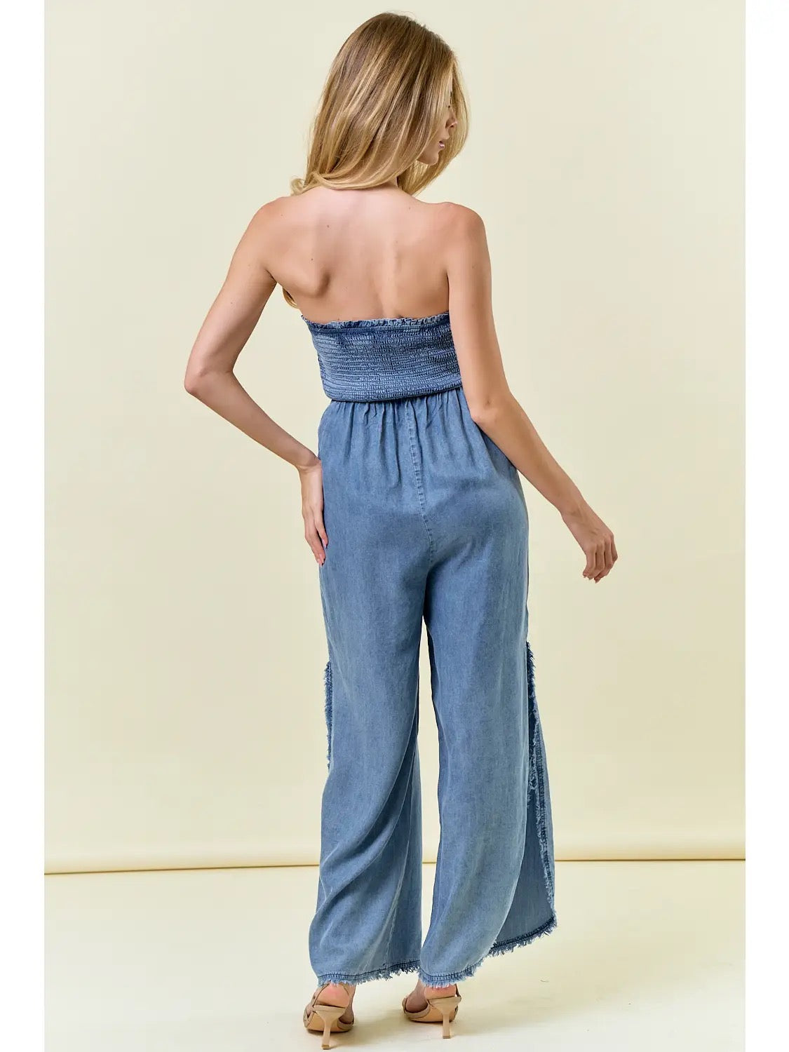 Denim Smocked Strapless Jumpsuit with Frayed Detail