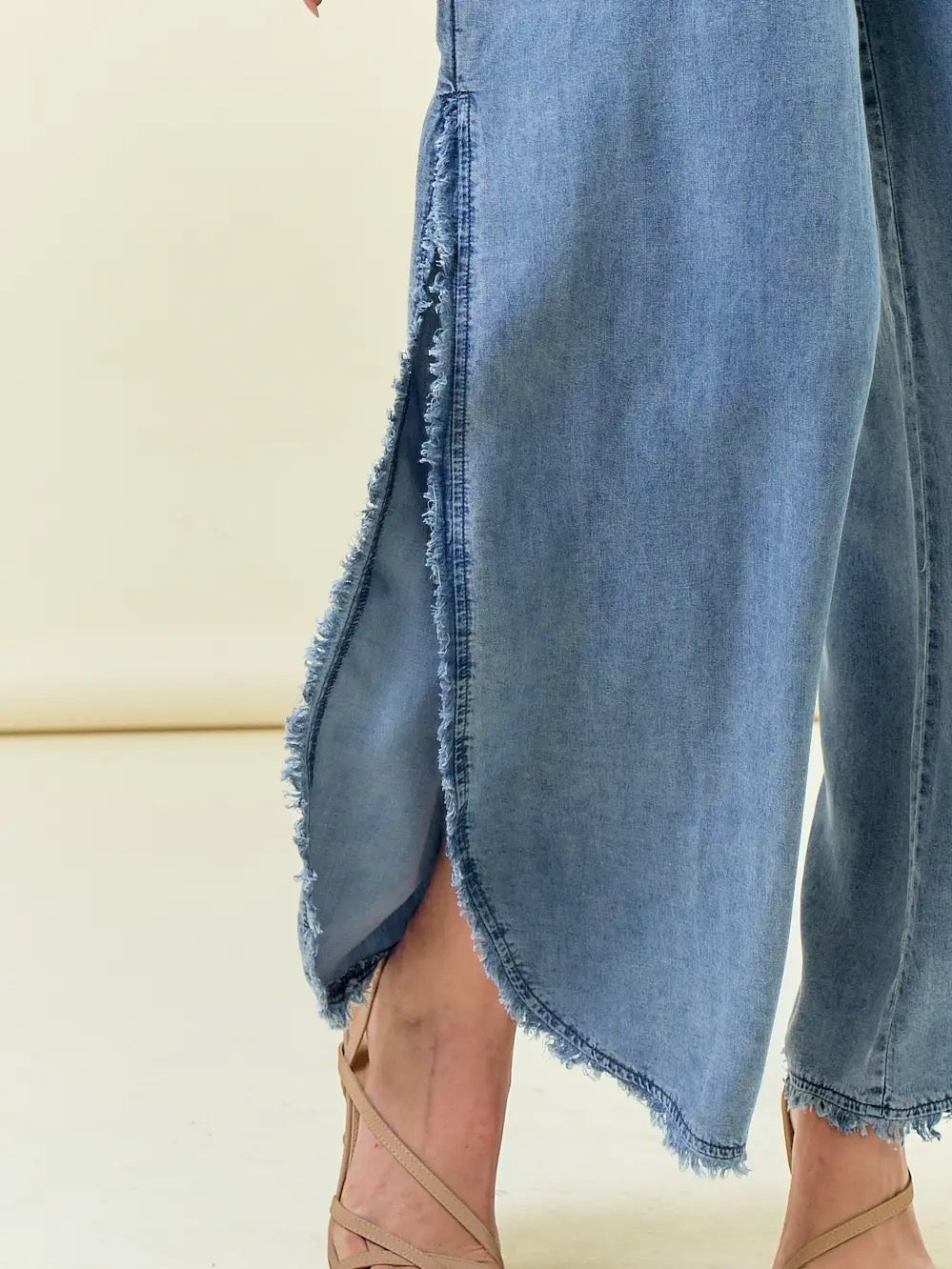 Denim Smocked Strapless Jumpsuit with Frayed Detail