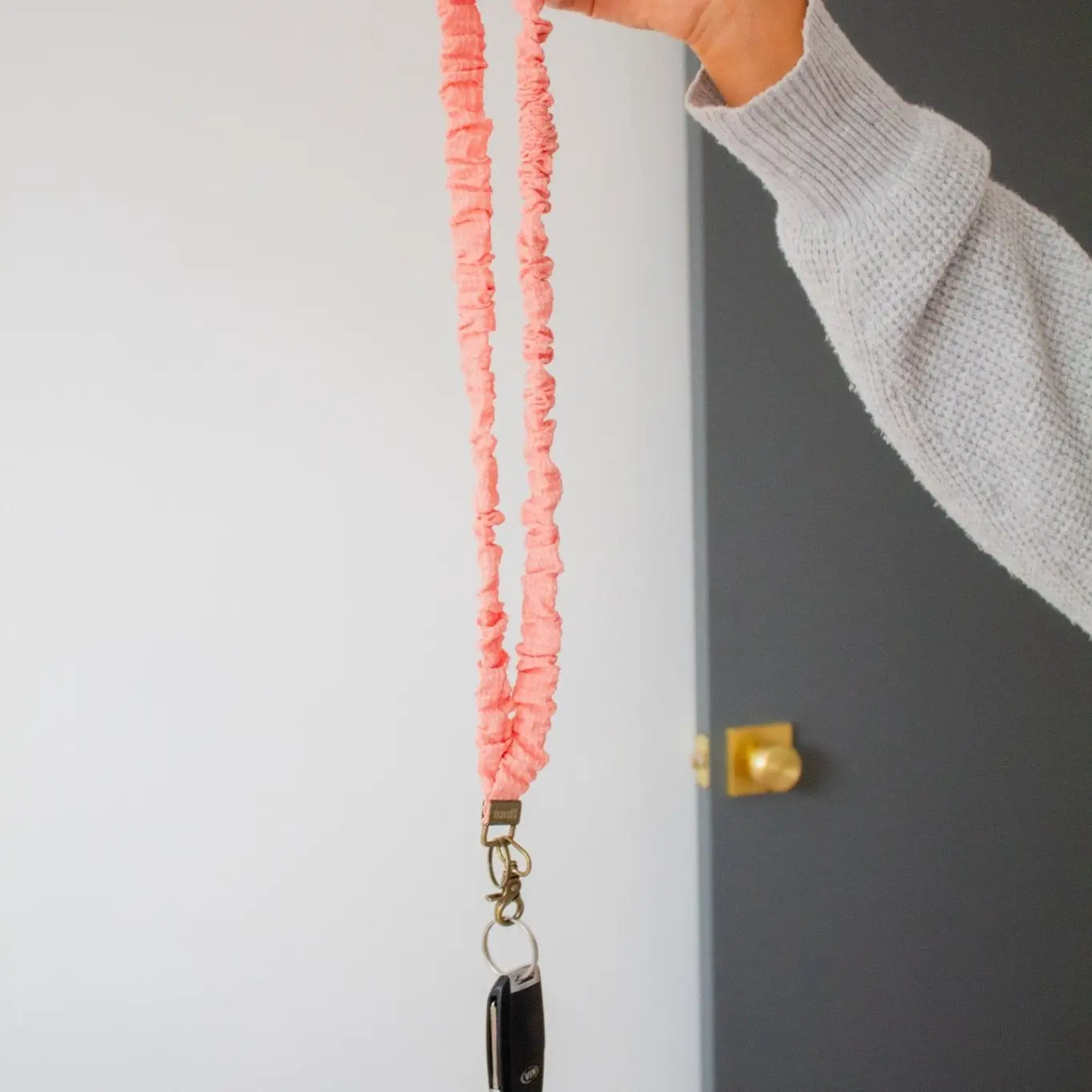 Shop Andi Coral Gingham Lanyard