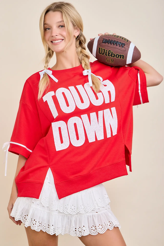 Touchdown Eyelet Appliqué Pullover Top